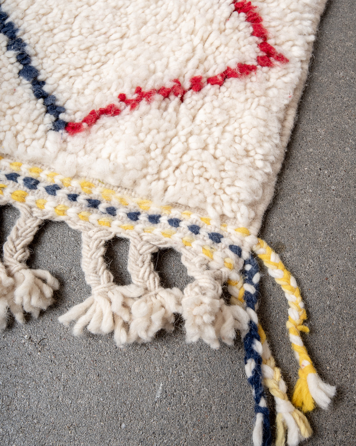 Modern, designer, handcrafted Berber rug from Morocco. Beniourain carpet with beautiful colours and patterns and fluffy wool texture.